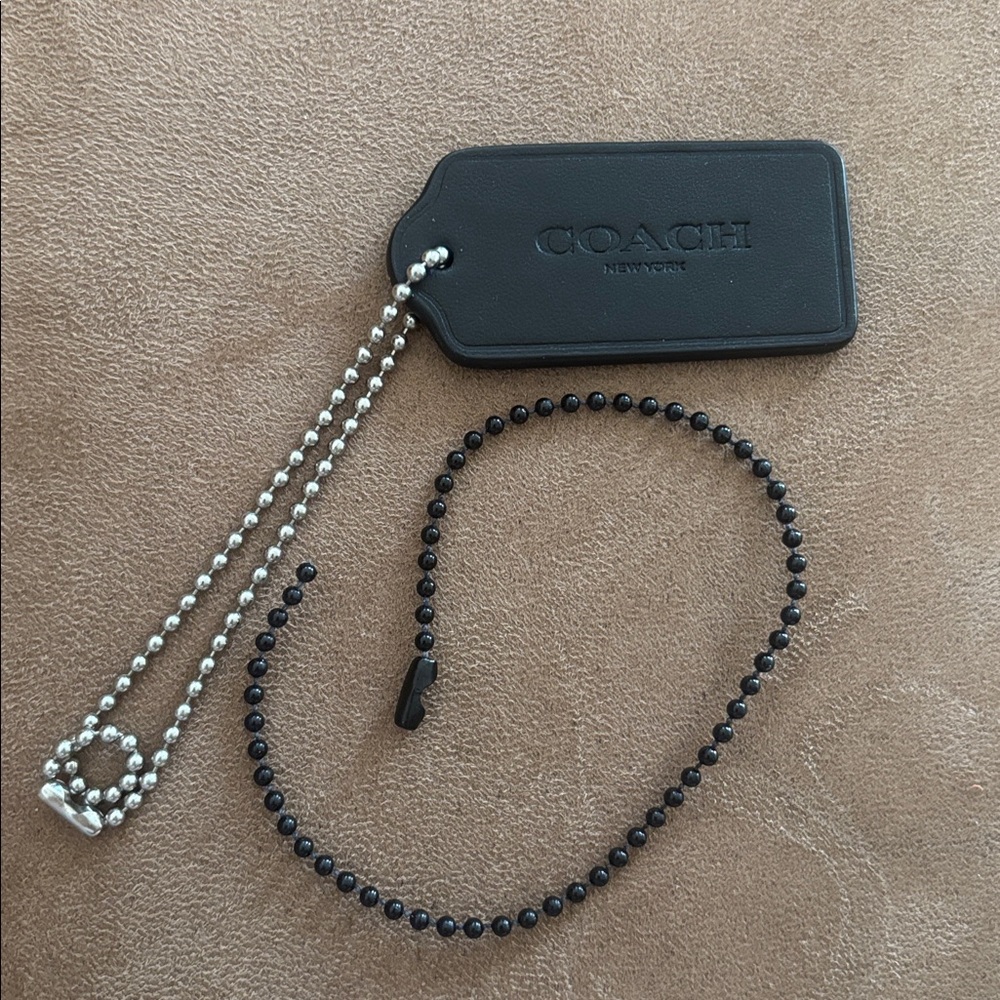Coach black Bag Charm Tag